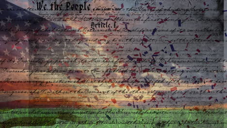 written constitution of the united states and flag with confetti