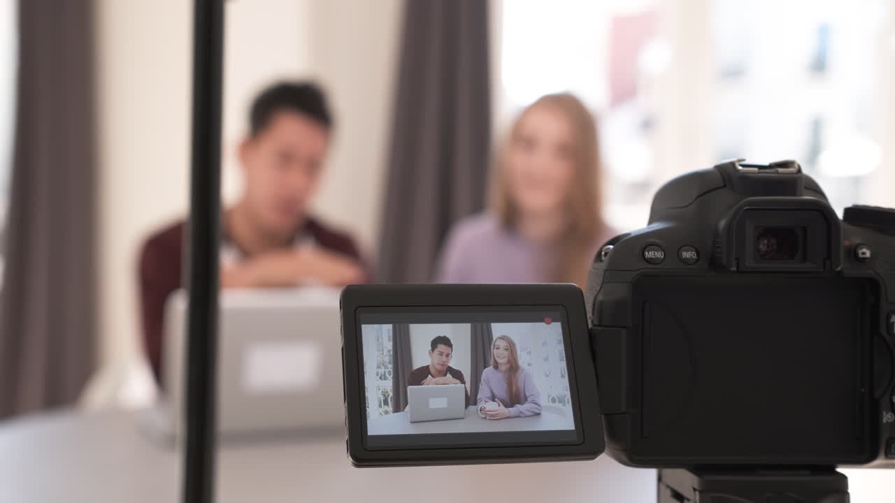 screen view, video bloggers making a video with a professional camera at home. Creator content concept