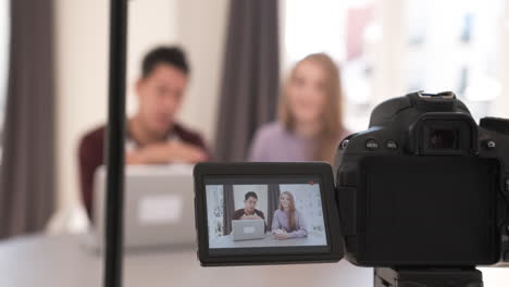 screen view, video bloggers making a video with a professional camera at home. creator content concept