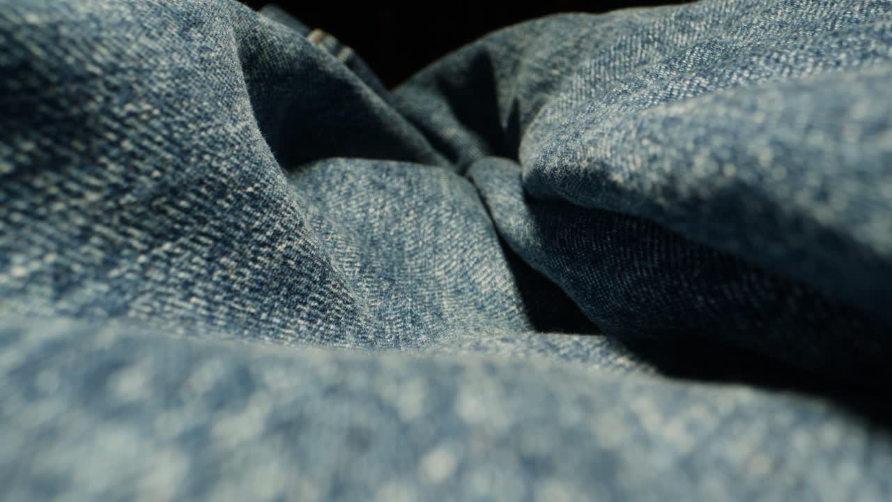 Close-up of Wrinkled Denim Fabric