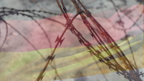 barbed wire against germany flag