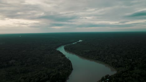 Aerial-panning-shot-of-amazon-river-and-dense-forest
