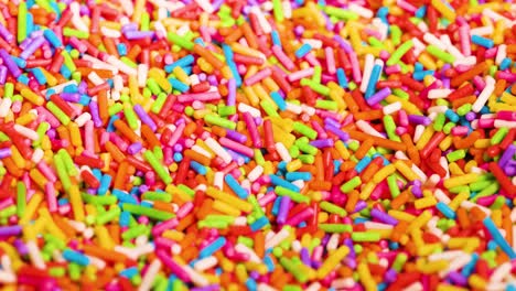 vibrant sprinkles moving in a dynamic pattern