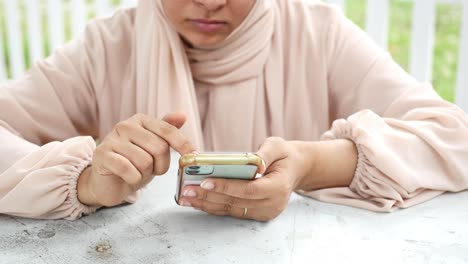 woman using smartphone outdoors