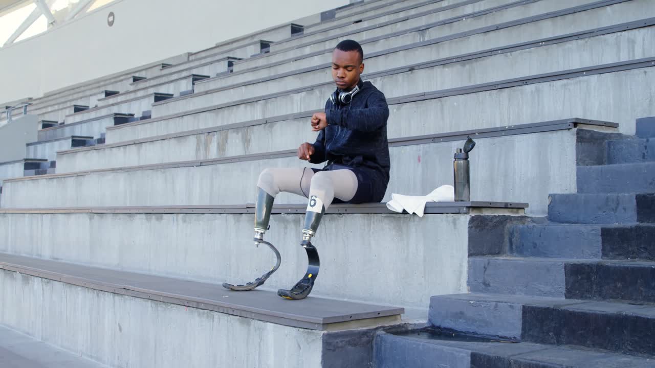 Disabled athletic using smartwatch 4k