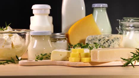 various dairy items arranged on a black background