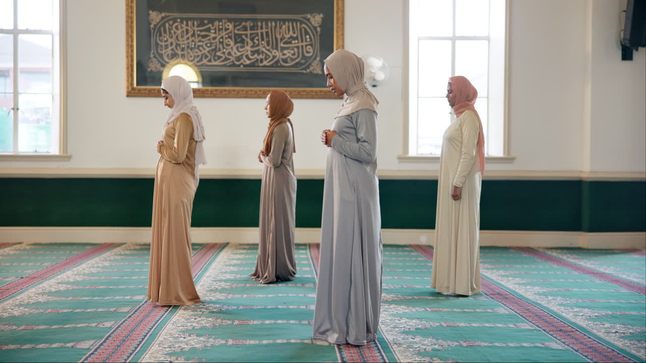 Muslim women praying in a mosque