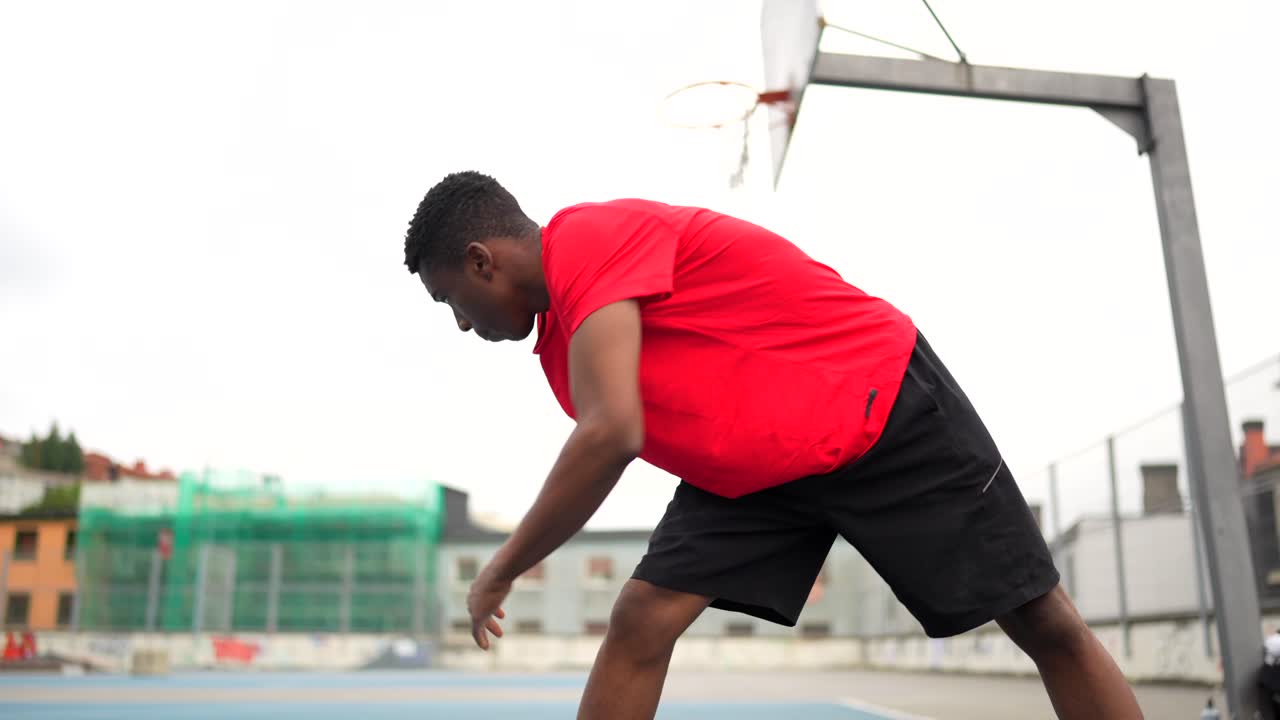 Athlete stretching on a basketball court