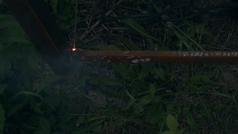 slow-motion-welding-of-country-house-fence-building-at-night