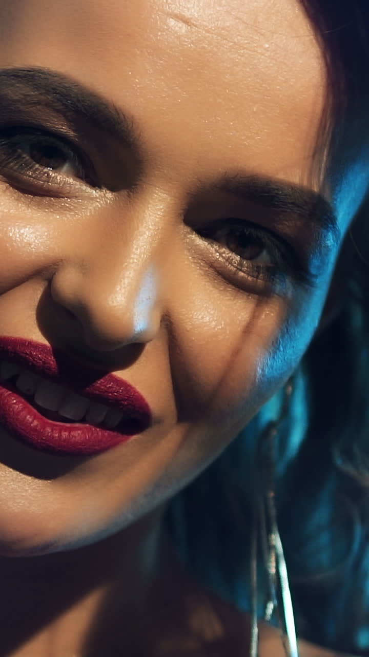 Woman singing in a recording studio. Female vocals. Professional recording studio. Vertical video