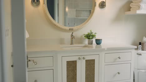 push in shot of bright white bathroom sink