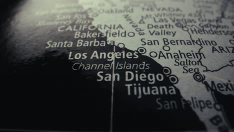 close up of a world map with cities in california highlighted.