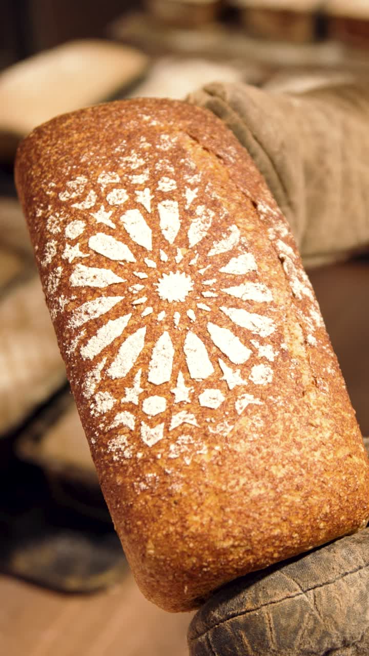 Freshly Baked Bread Loaf with Decorative Flour Pattern