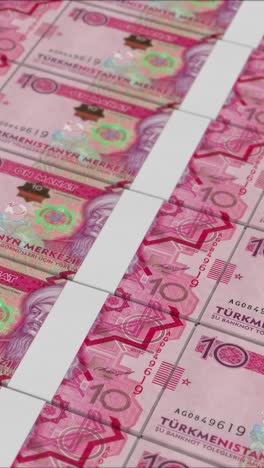video vertical de billetes de 10 manat de turkmenistán impresos por una imprenta de dinero