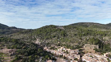 drone shot of the esporles valley on the island village of mallorca in the serra de tramuntana, spain