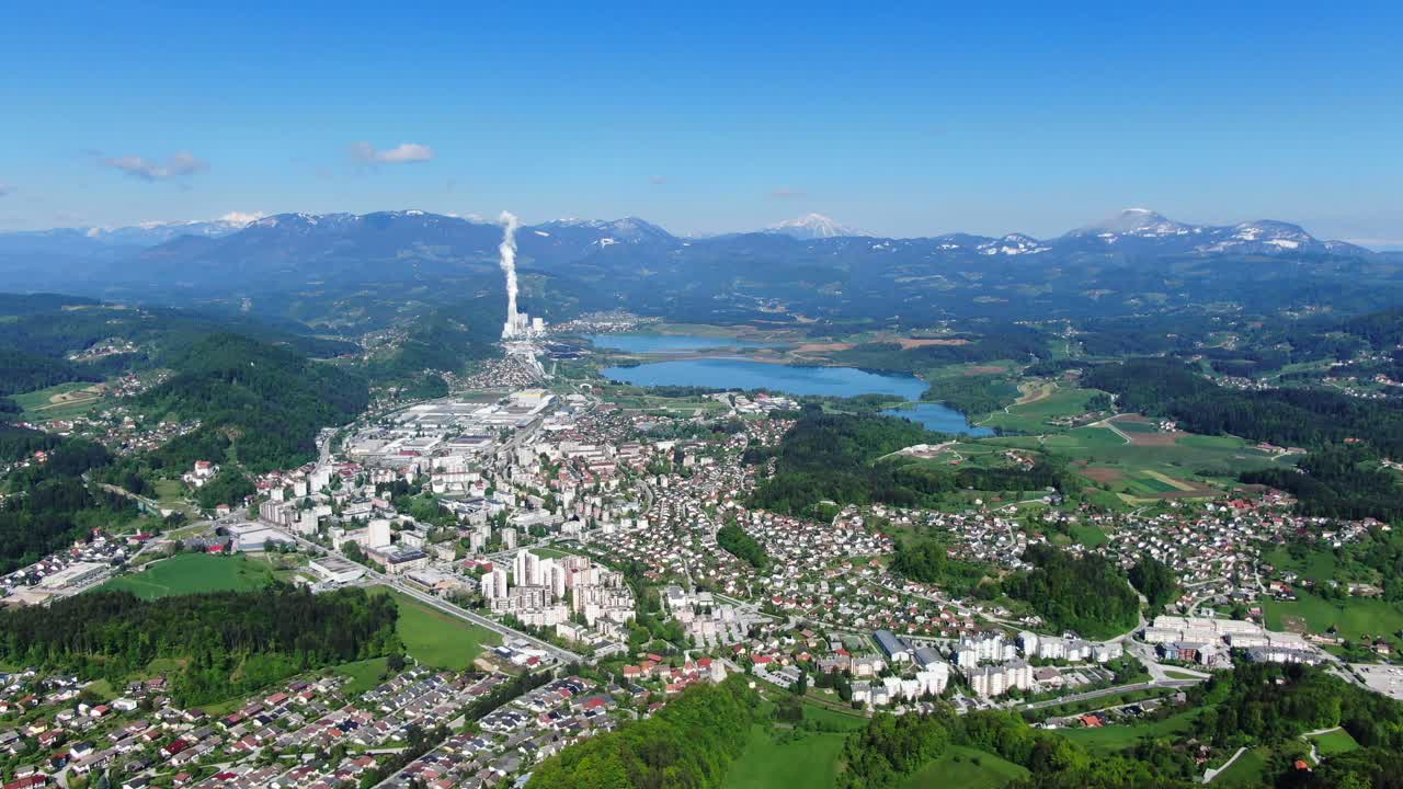 Beautiful Aerial view from flying drone on a small town with beautiful landscape surrounding it