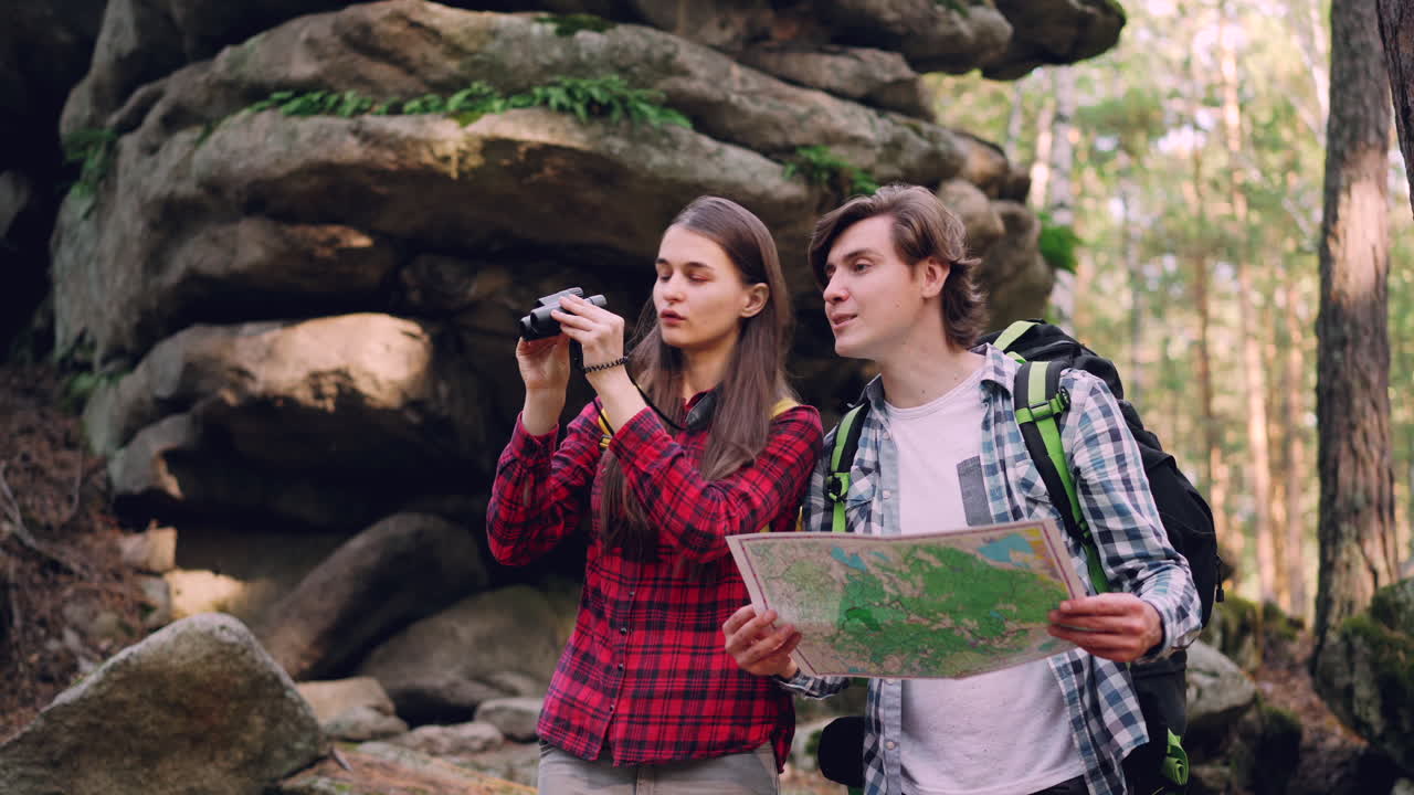 Couple Hiking and Exploring a Forest