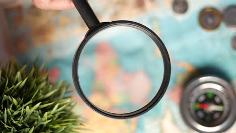 magnifying glass over a map