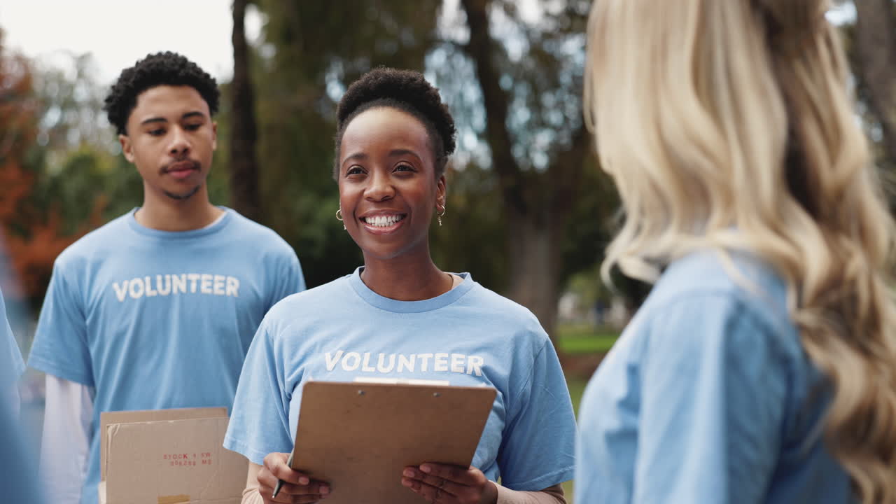 Group of Volunteers Smiling and Working Together