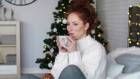 Girl-drinking-hot-tea-at-home