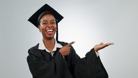 Graduation,-woman-and-student-pointing-at-hand