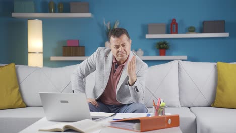 home office worker man looking nervously at camera.
