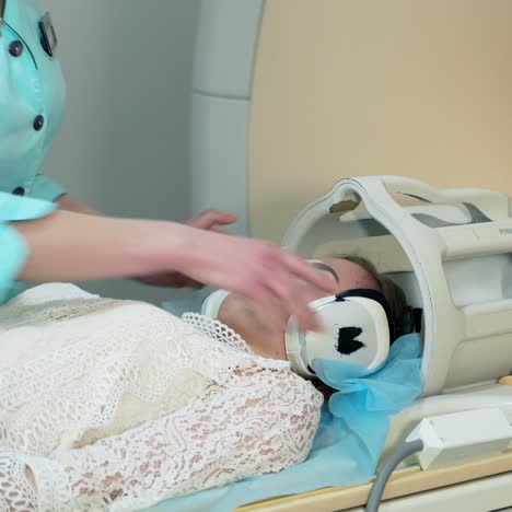 patient lying on the tc scanner