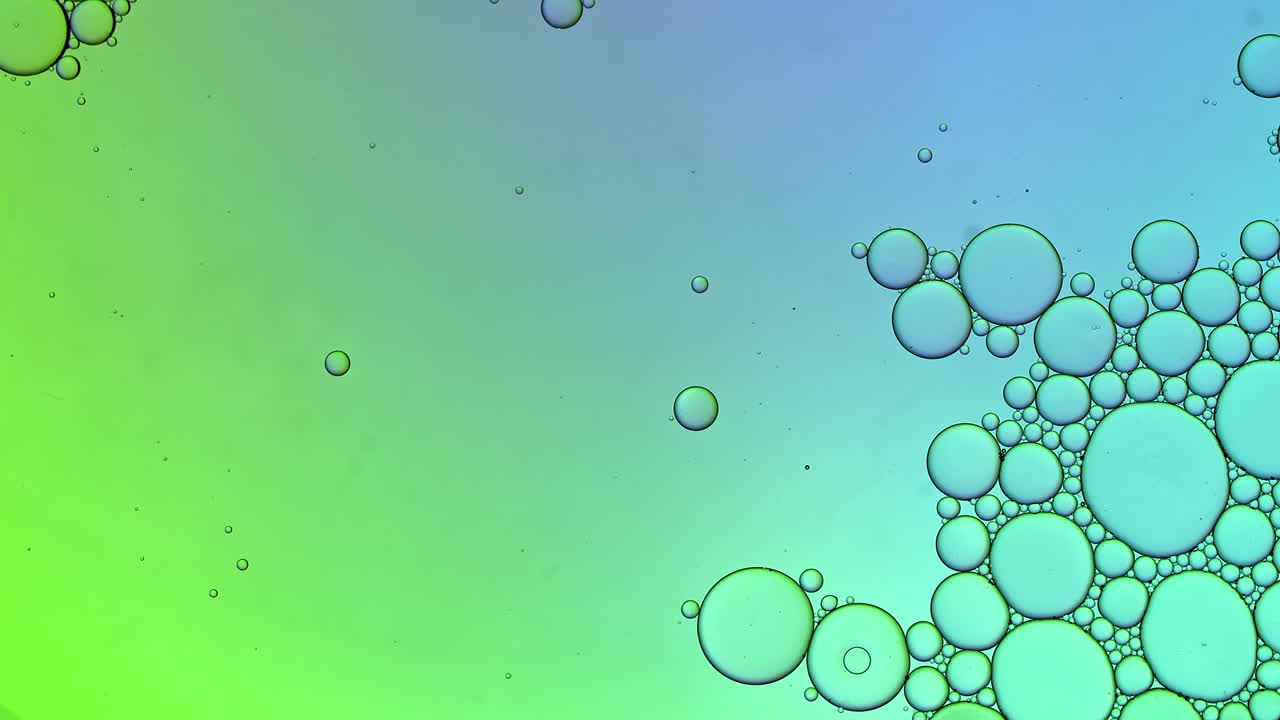 Abstract Colorful Food Oil Drops Bubbles and spheres Flowing