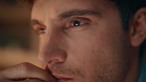 portrait tired late worker rubbing eyes at dark workplace. businessman fatigue