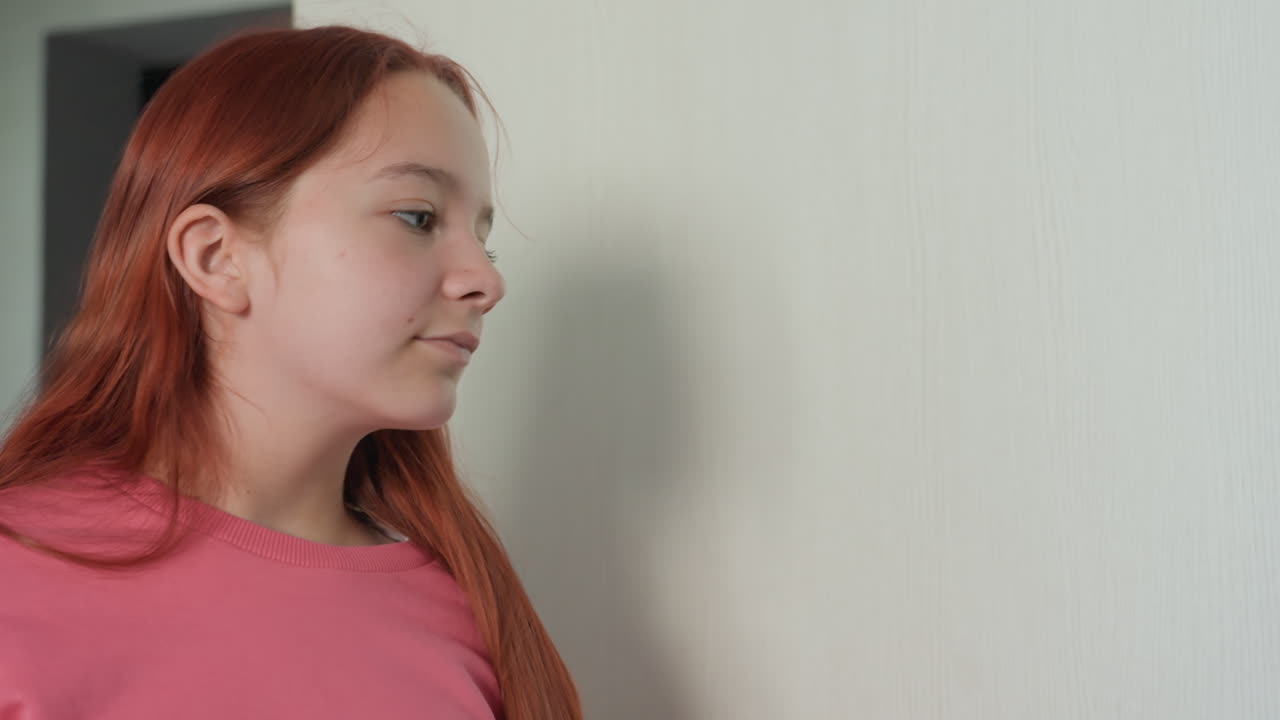 Girl Examines Closet, Youthful Girl Explores Hidden Wardrobe, Redheaded Girl Curiously Investigates Bedroom Closet Door, Curious Young Girl With Red Hair Inspects Bedroom Wardrobe Quietly