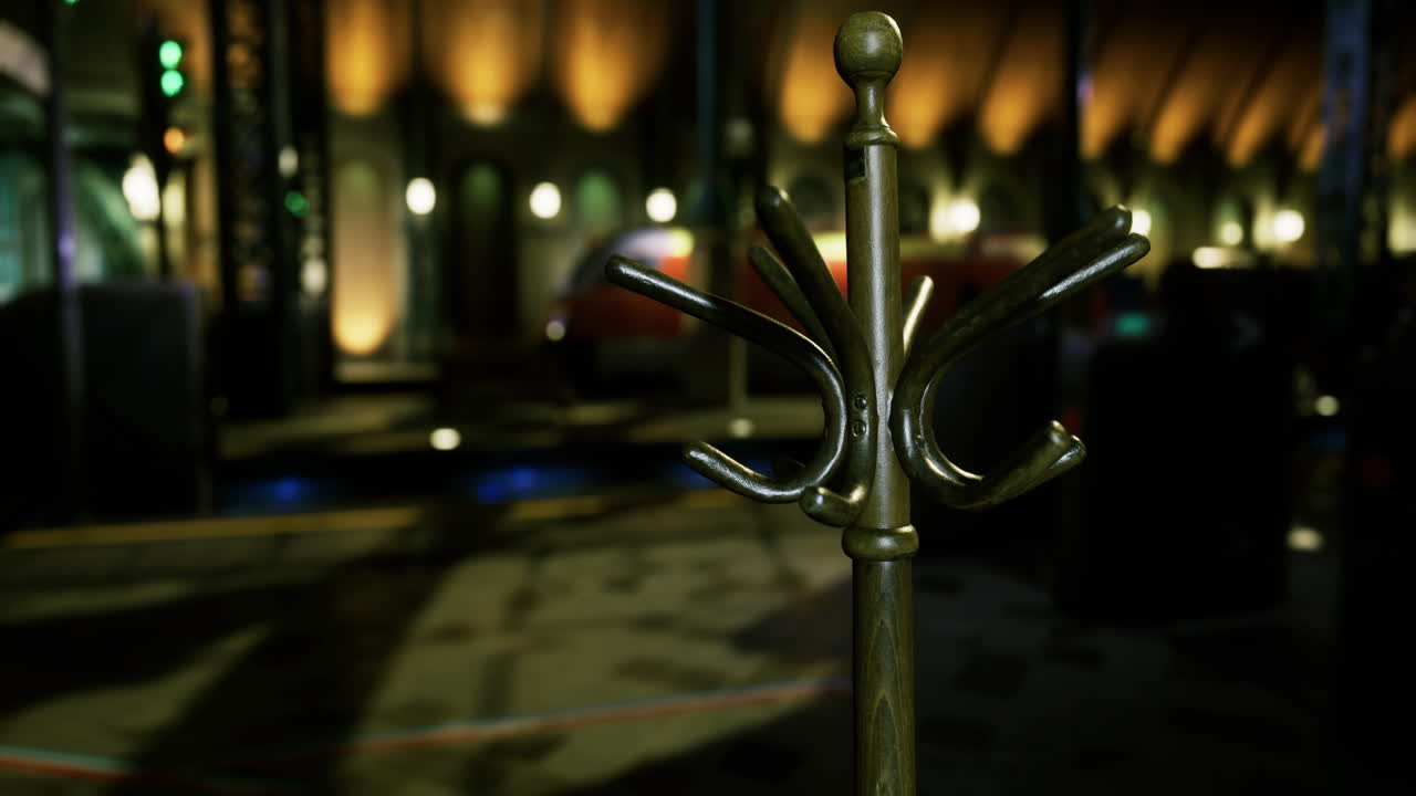 Hooks stand in a stylish interior space with dim lighting and modern design