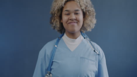 nurse holding a bottle of pills