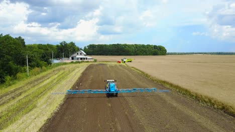 self-propelled sprayer on farm. vinnitsa, ukraine - july 2017: self-propelled sprayer irrigating crops on agriculture farm