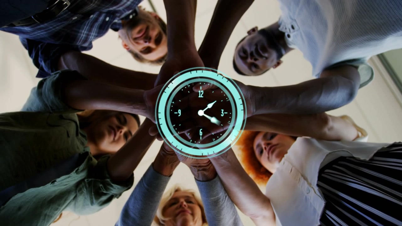 Diverse Team Joining Hands with Digital Clock Overlay