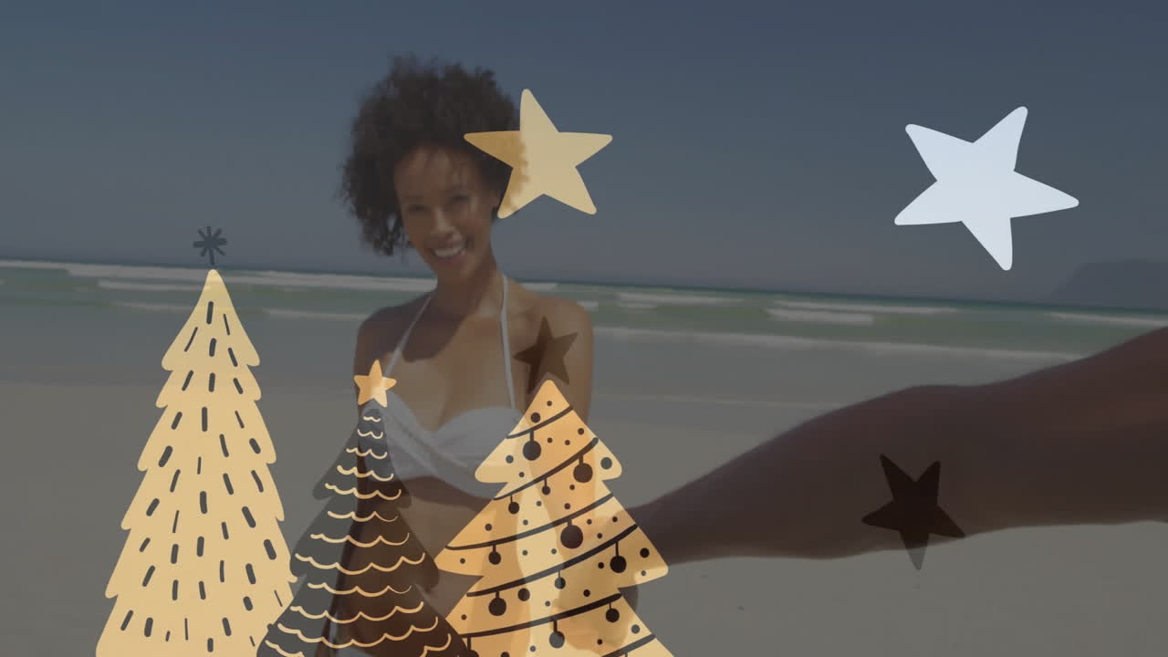Woman in white bikini on beach with Christmas tree and star animation overlay