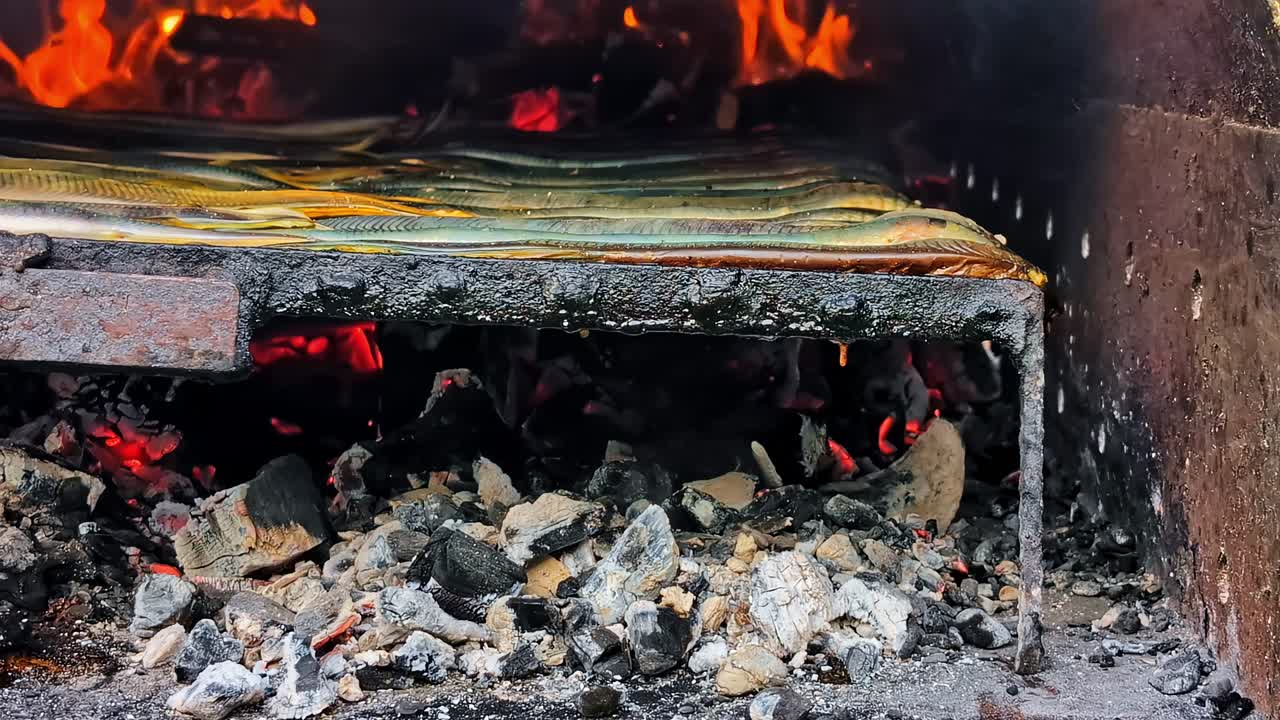Grilled Eel Cooking on an Open Fire