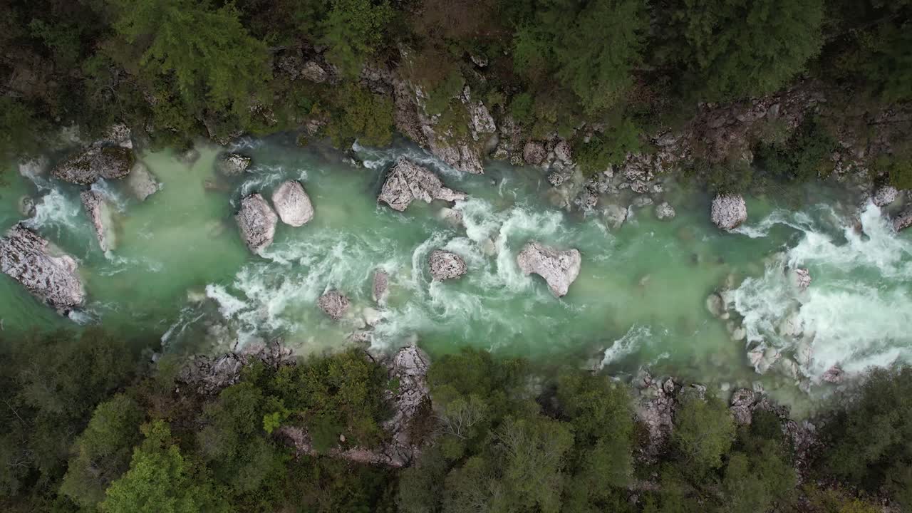 Soca river Slovenia and nature surrounding, aerial shot, birt eye view, turquoise waters alpine river