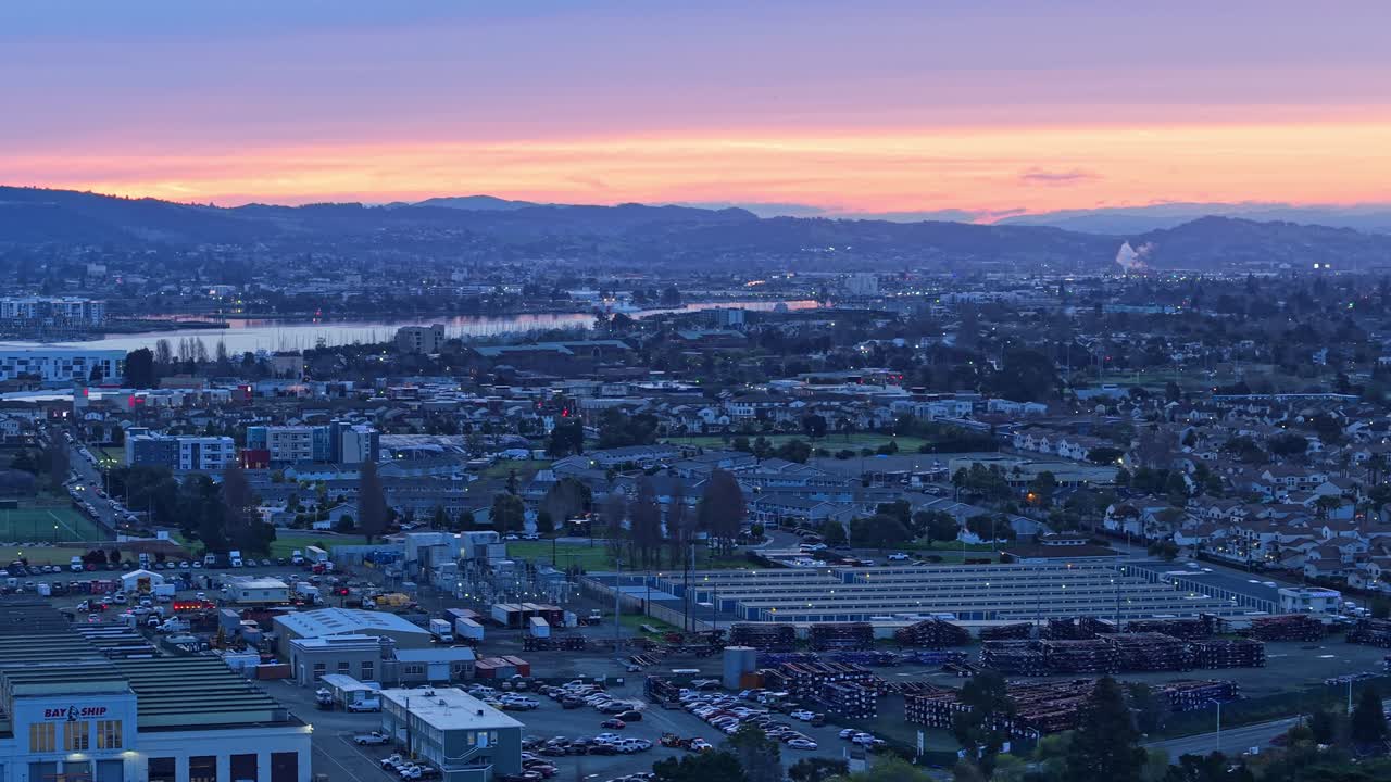 Aerial panning shot of surroundings of Alameda Point in the early morning.