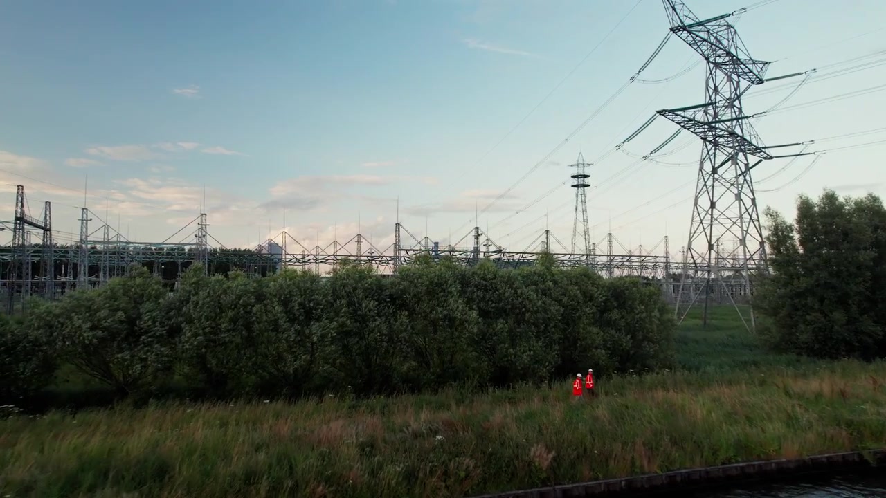 Flying Above Amsterdam-Rhine Canal Towards Power Station In Diemen, Netherlands. drone approach