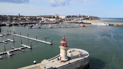 lighthouse at ramsgate harbour kent uk aerial 4k footage