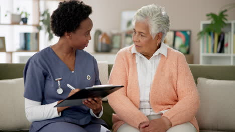 home healthcare visit between nurse and senior woman