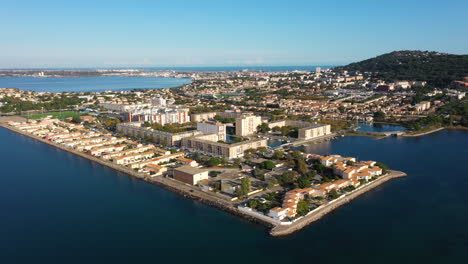 island of thau sete aerial shot etang de thau sunny day residential buildings