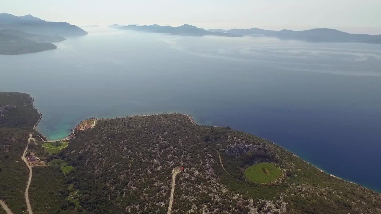 Flight over desert islands and colorful sea, Brijuni park, Croatia