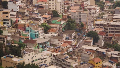 aerial top down shot of poor old rocinha favela with dense colorful houses in rio de janeiro, brazil