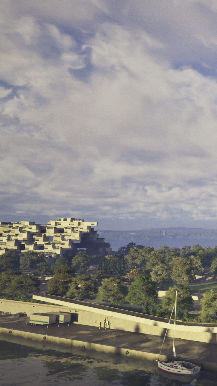 Building near water with greenery and clouds in the background
