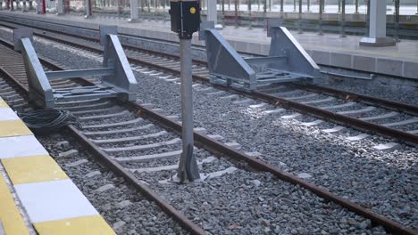 train tracks and platform at a train station