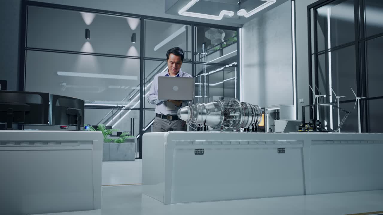 현대적인 실험실에서 제트 엔진 모델을 작업하는 엔지니어