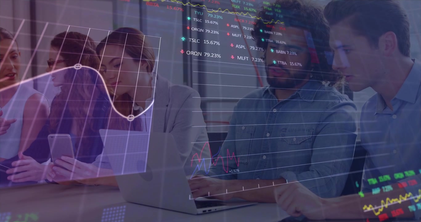 Business Team Analyzing Financial Data on Laptop in Office