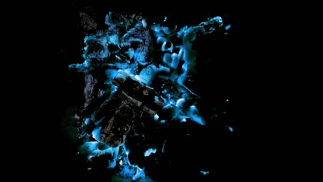 blue colored flame of coal burning