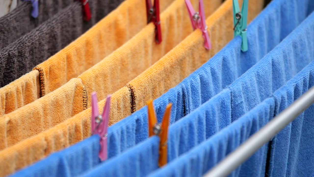 Colorful towels hanging on a clothesline